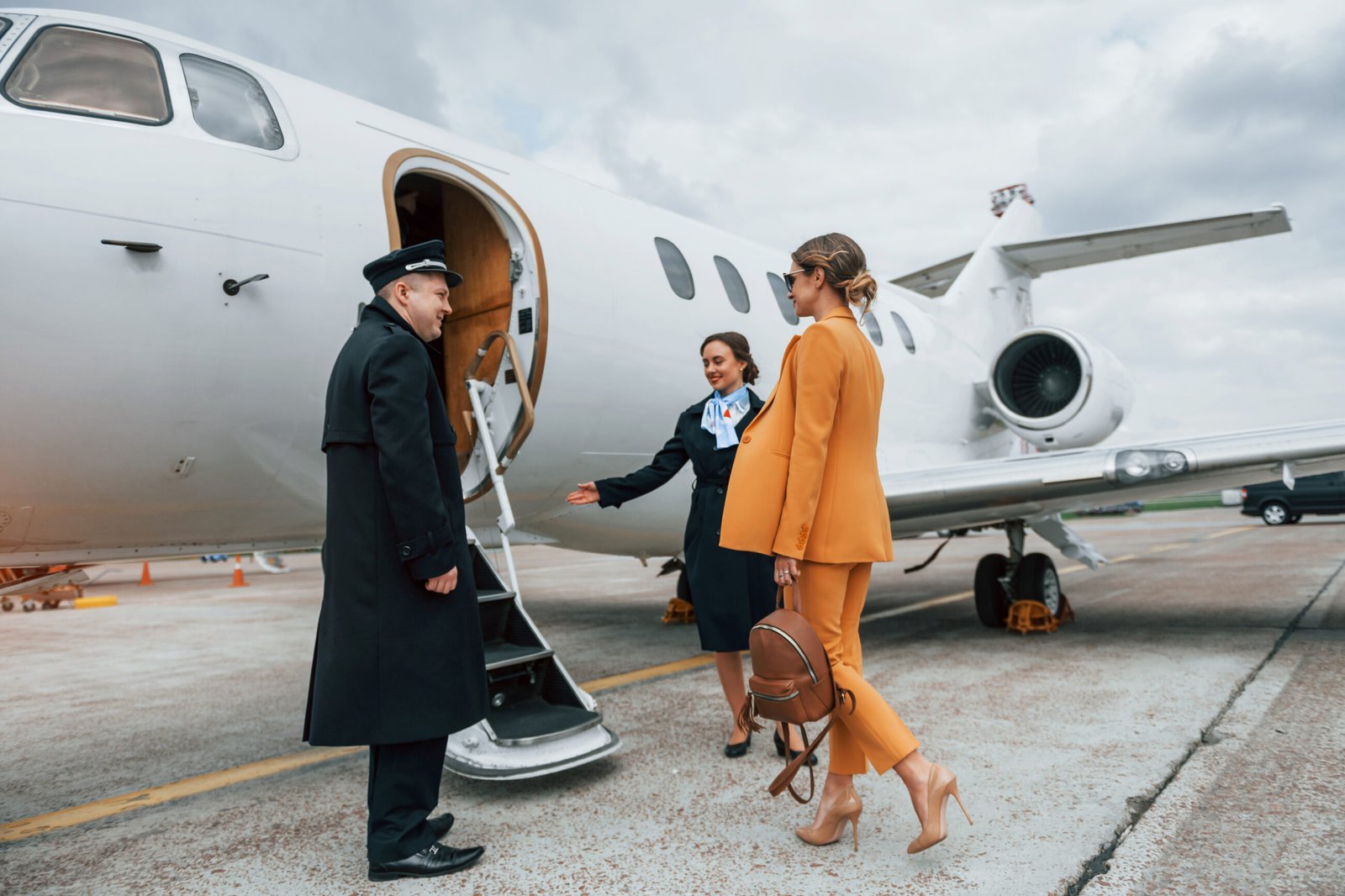 Passenger boarding a private jet.