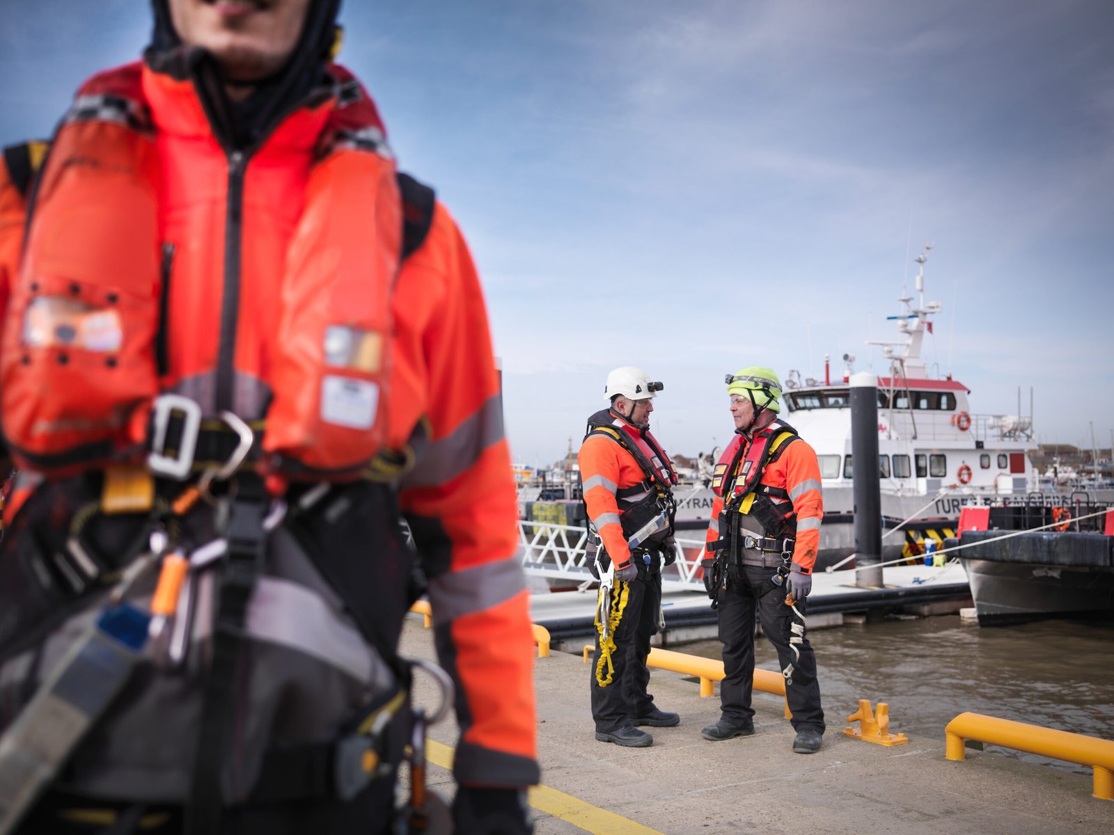 workers-wearing-safety-gear-on-the-docks-2026-03-10-02-02-16-utc Compliant Cross Border Employment